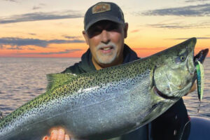 The editor, Mark Romanack, caught this excellent chinook salmon, pulling long lengths of weighted stainless-steel wire on Lake Michigan with the help of an OR37 SST Pro Mag Planer Board to spread out lines and cover more water. When it comes to the “heavy lifting” in trolling the OR37 SST Pro Mag has no equal.